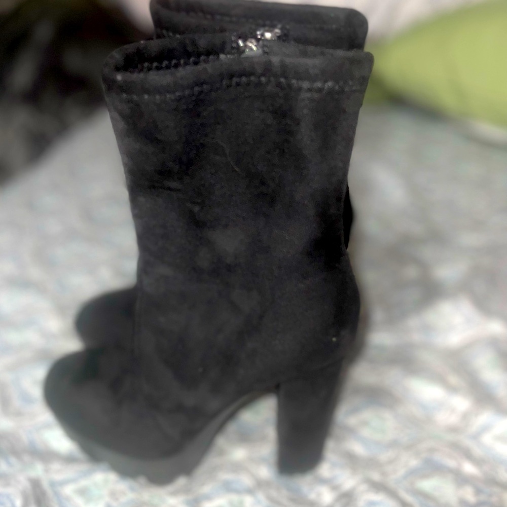 Black platform heeled boots